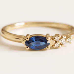 Asymmetric Sapphires Marquise ring