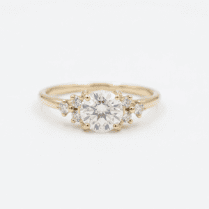 Round diamond engagement ring with side diamonds