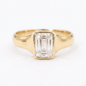 Emerald cut moissanite signet ring